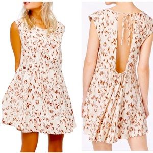 FREE PEOPLE Fake Love Animal Print Mini Dress size L